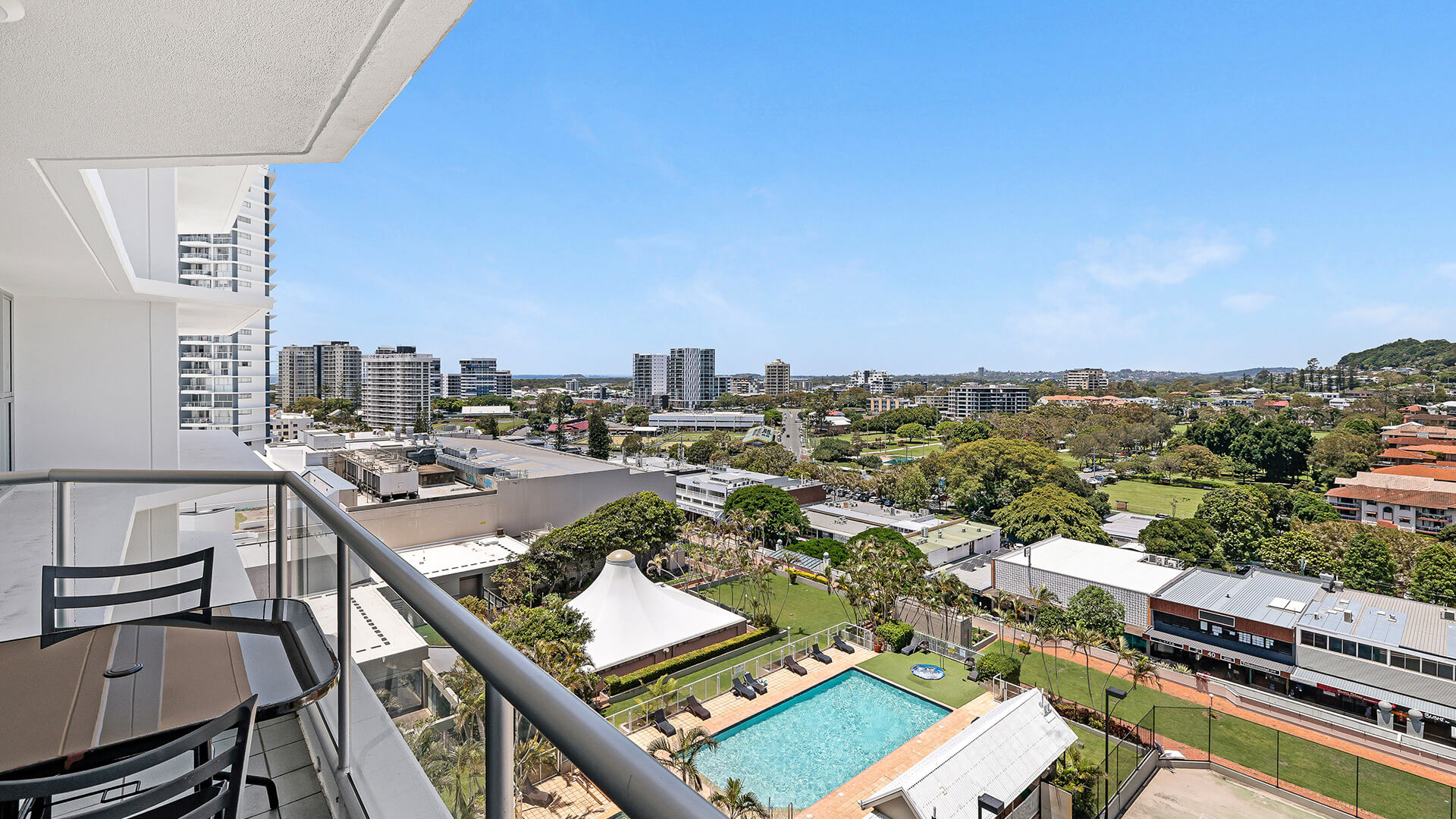 Balcony in the 2 Bedroom Pool View Apartment at ULTIQA Points North overlooking the resort pool and Coolangatta skyline.