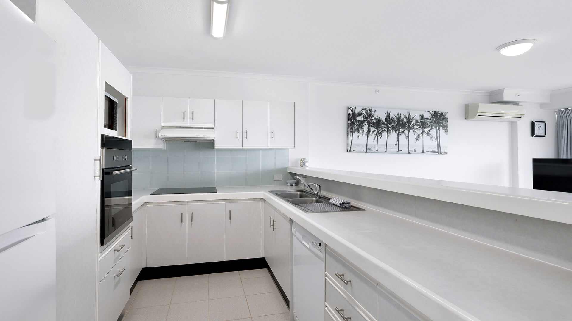 Fully equipped kitchen in the Standard 2 Bedroom Centre Front Apartment, featuring ample bench space and modern appliances.