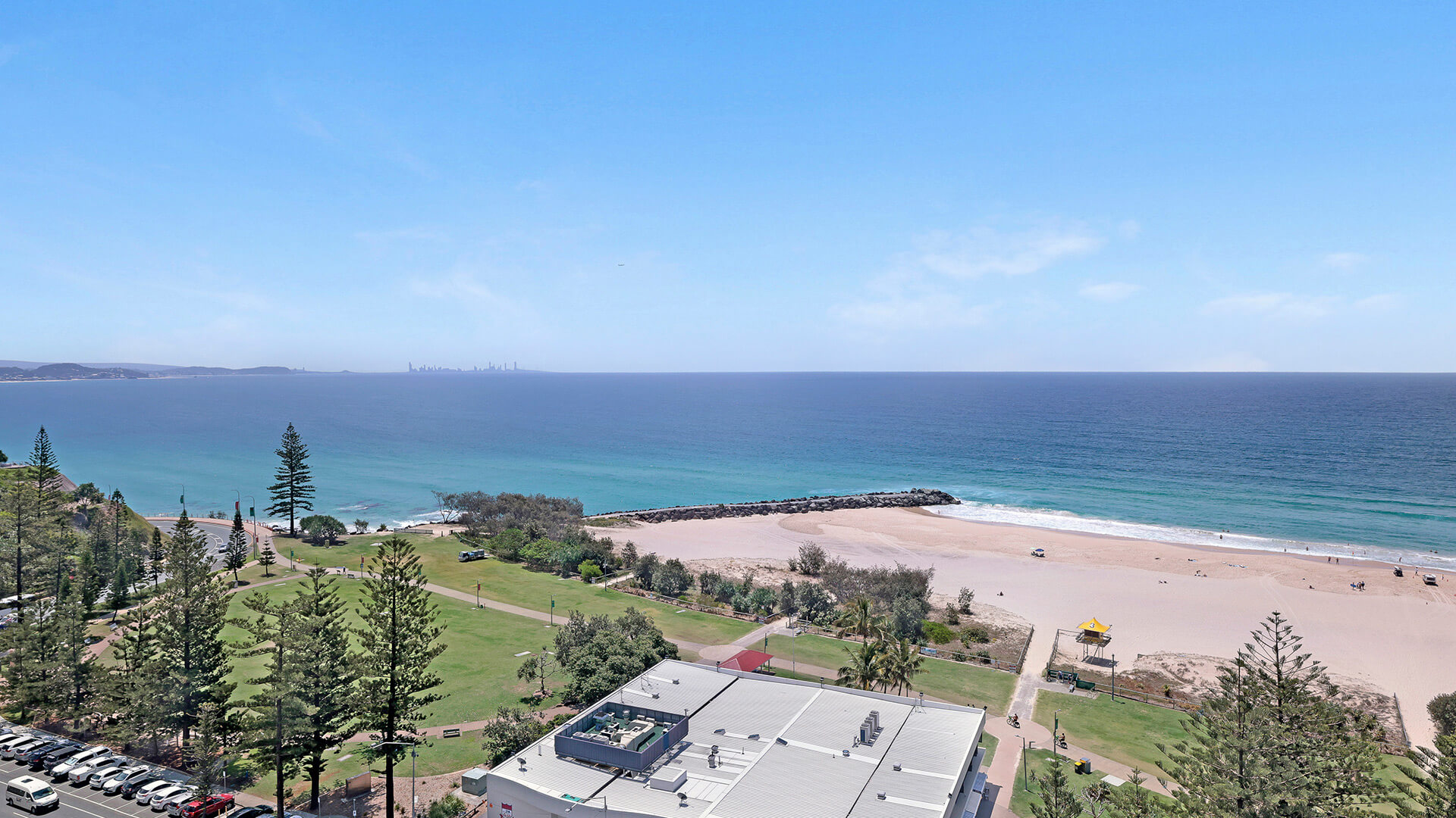 Ocean and beach view from the Standard 2 Bedroom Ocean View Apartment at ULTIQA Points North, overlooking Coolangatta Beach and parklands.