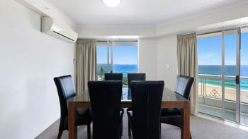 Oceanfront dining area in the Deluxe 2 Bedroom Centre Front Apartment at ULTIQA Points North.