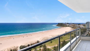 Expansive beachfront views from the Deluxe 2 Bedroom Centre Front Apartment balcony at ULTIQA Points North.