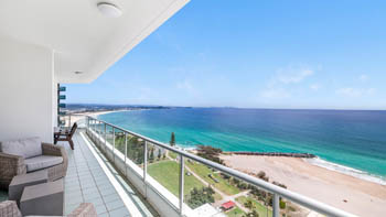 Balcony of the 4 Bedroom Oceanfront Penthouse at ULTIQA Points North overlooking the coastline and ocean.