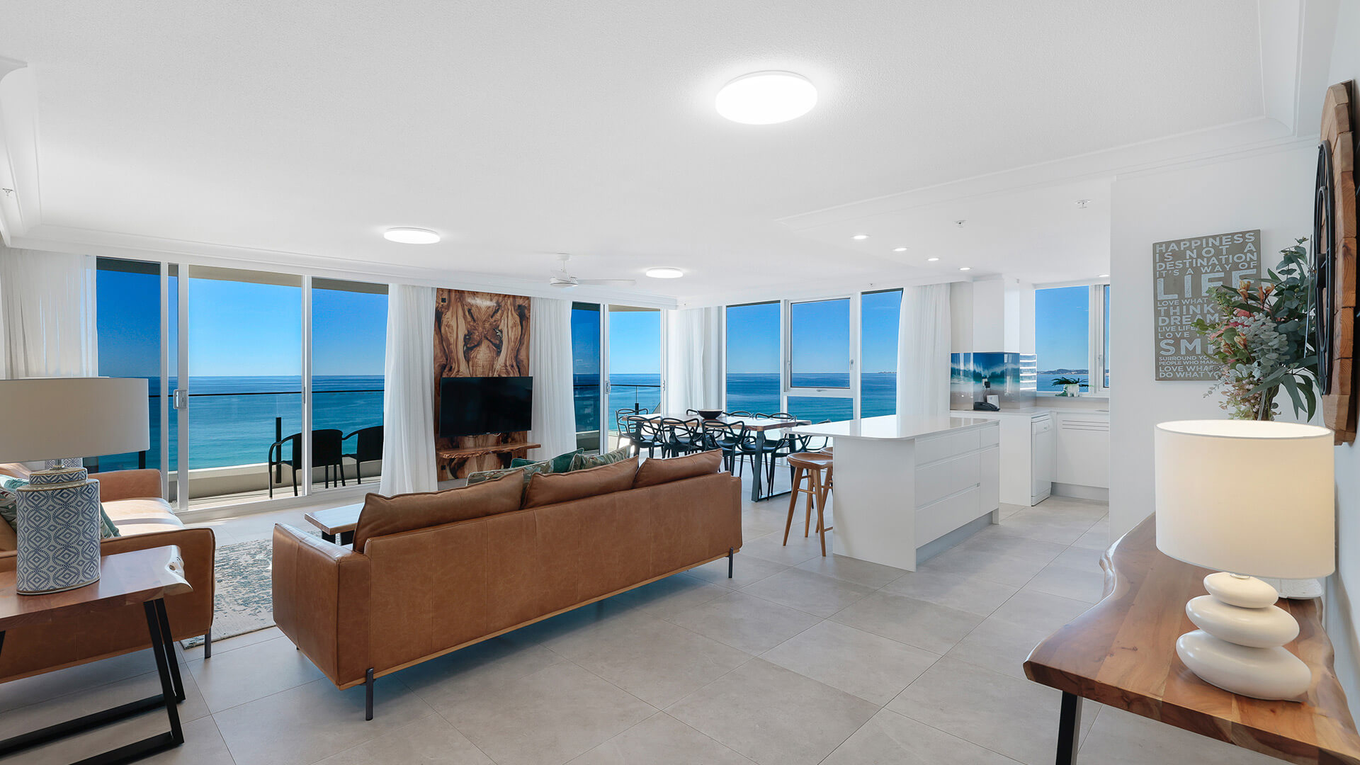 Spacious oceanfront living, dining and kitchen at ULTIQA Beach Haven, Surfers Paradise, Gold Coast