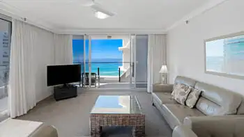 Living area with ocean views in the Standard 2 Bedroom Ocean View Apartment at ULTIQA Beach Haven on Broadbeach.