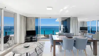 Dining and lounge area with stunning ocean views in the Sub Penthouse at ULTIQA Beach Haven on Broadbeach.