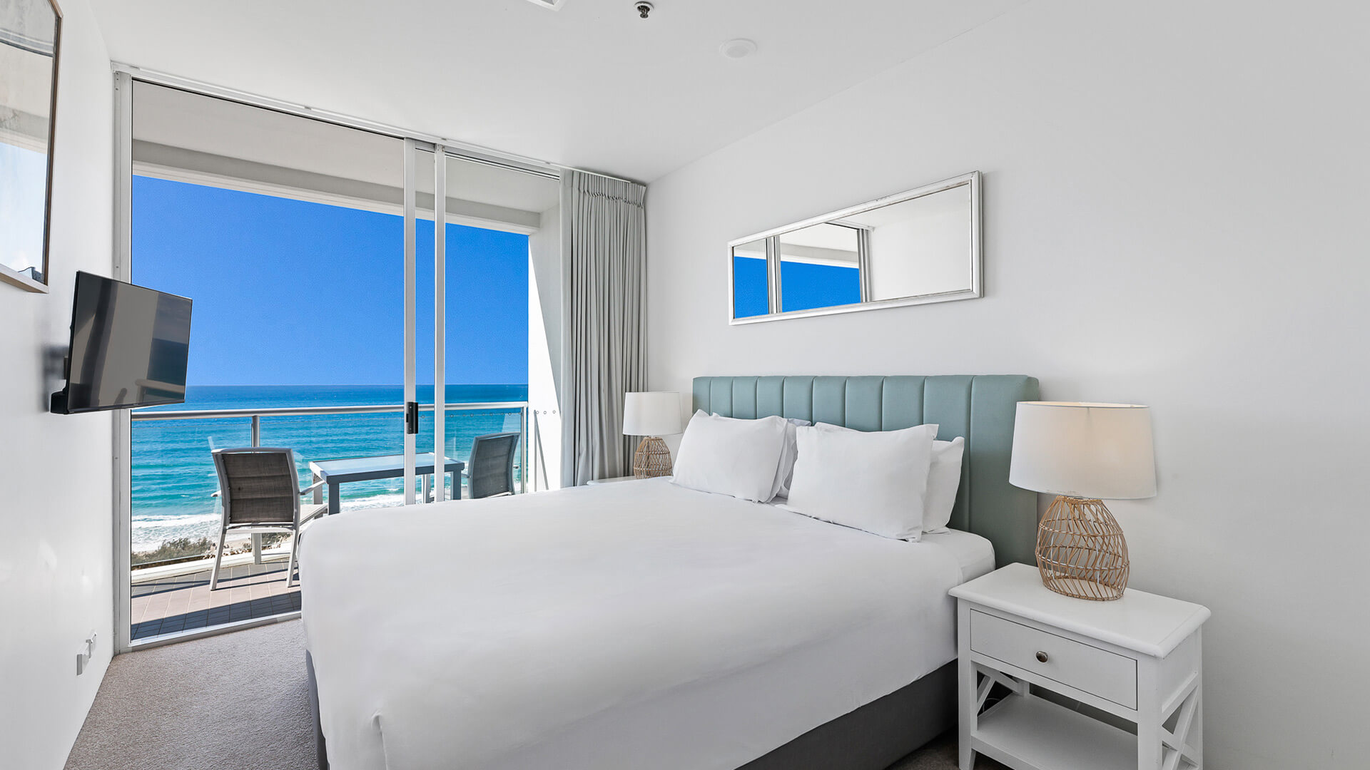 Bedroom with ocean views and balcony in 1 Bedroom Ocean View Apartment at ULTIQA Air on Broadbeach.
