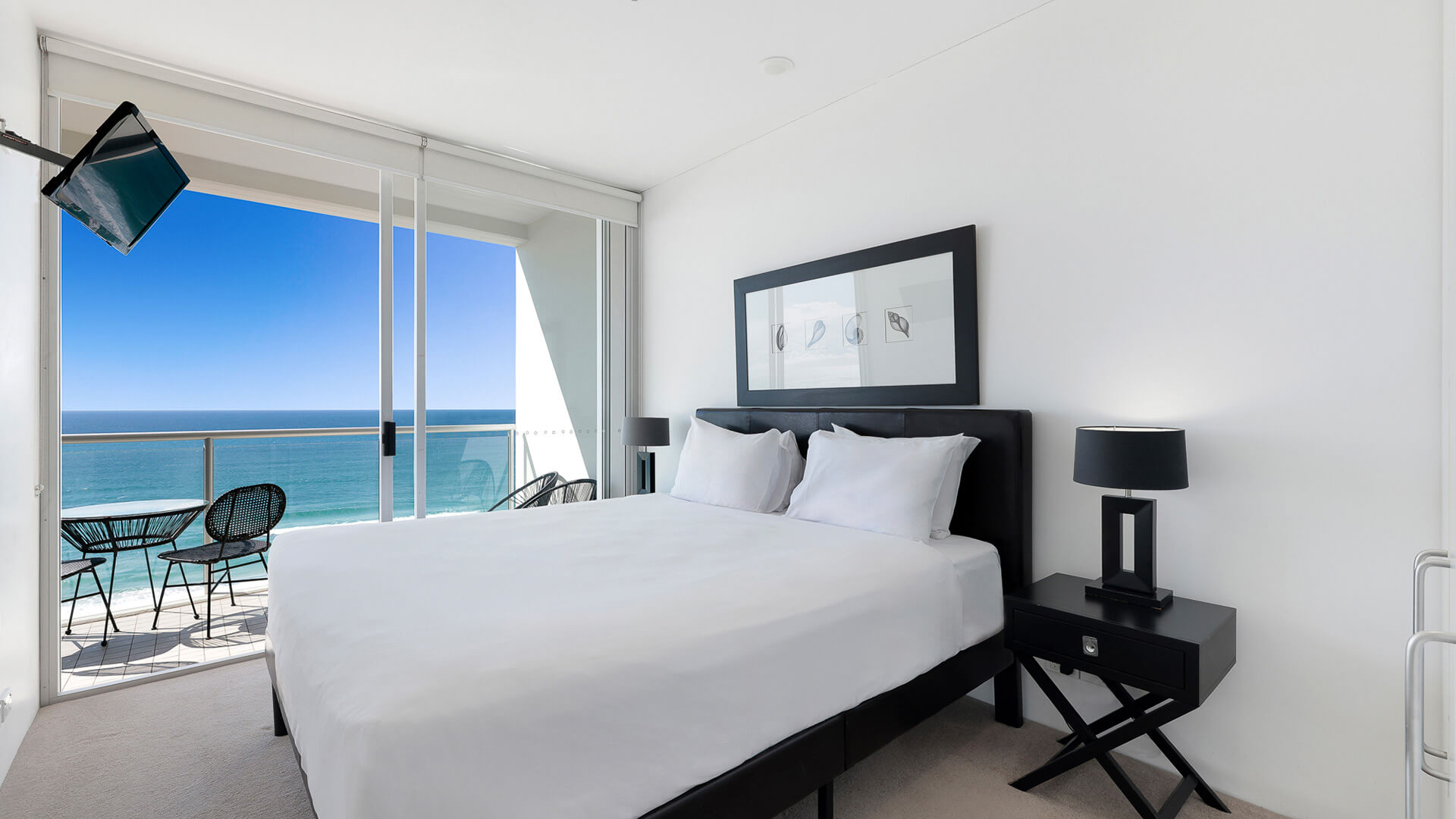 Bedroom with ocean views and balcony in 1 Bedroom Ocean View Apartment at ULTIQA Air on Broadbeach.