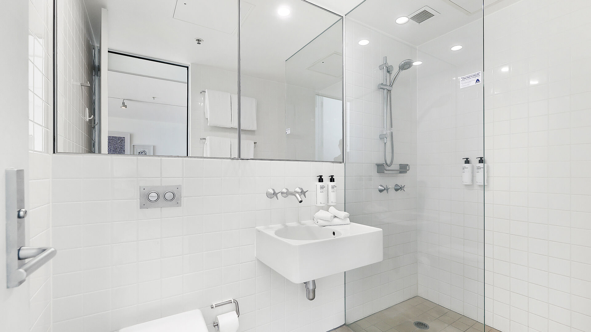 Bathroom with walk-in shower in 1 Bedroom Ocean View Apartment at ULTIQA Air on Broadbeach.