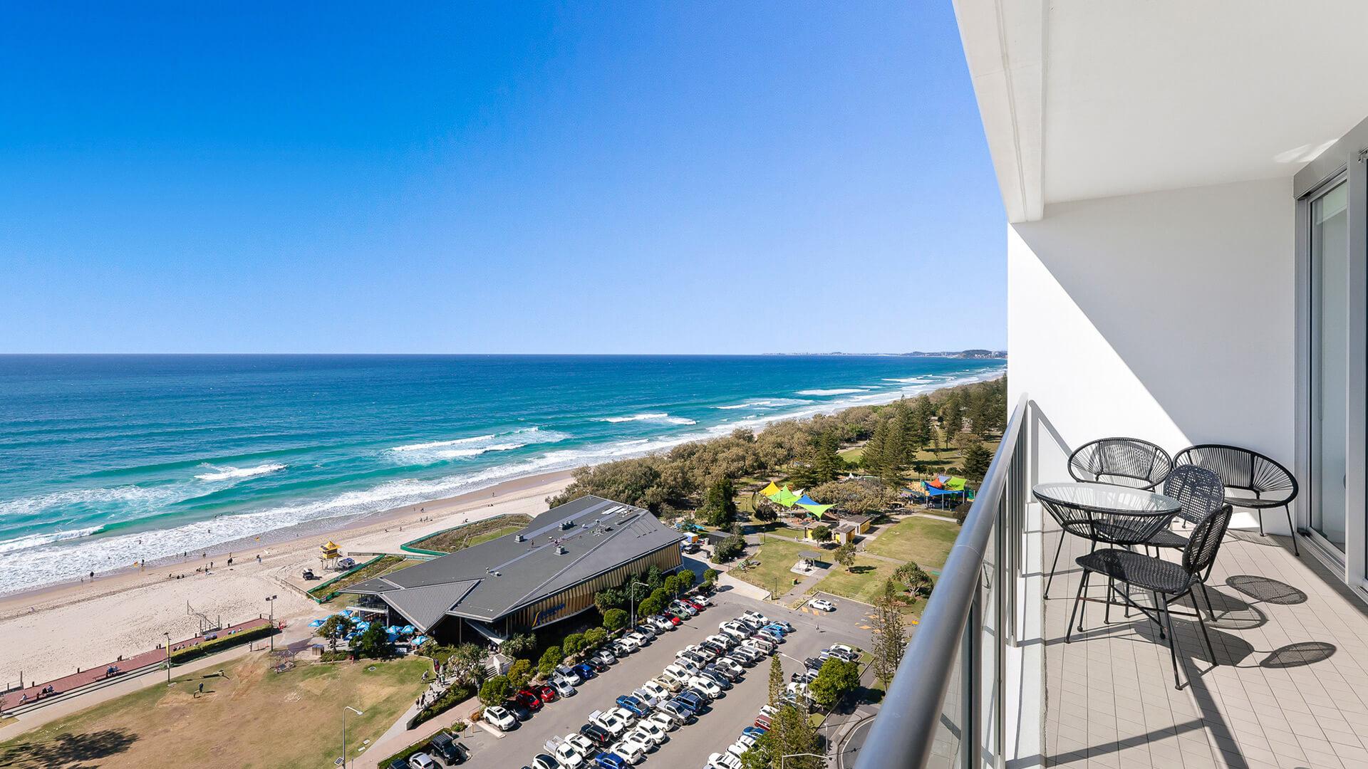 Private balcony with seating and ocean views in 1 Bedroom Ocean View Apartment at ULTIQA Air on Broadbeach.