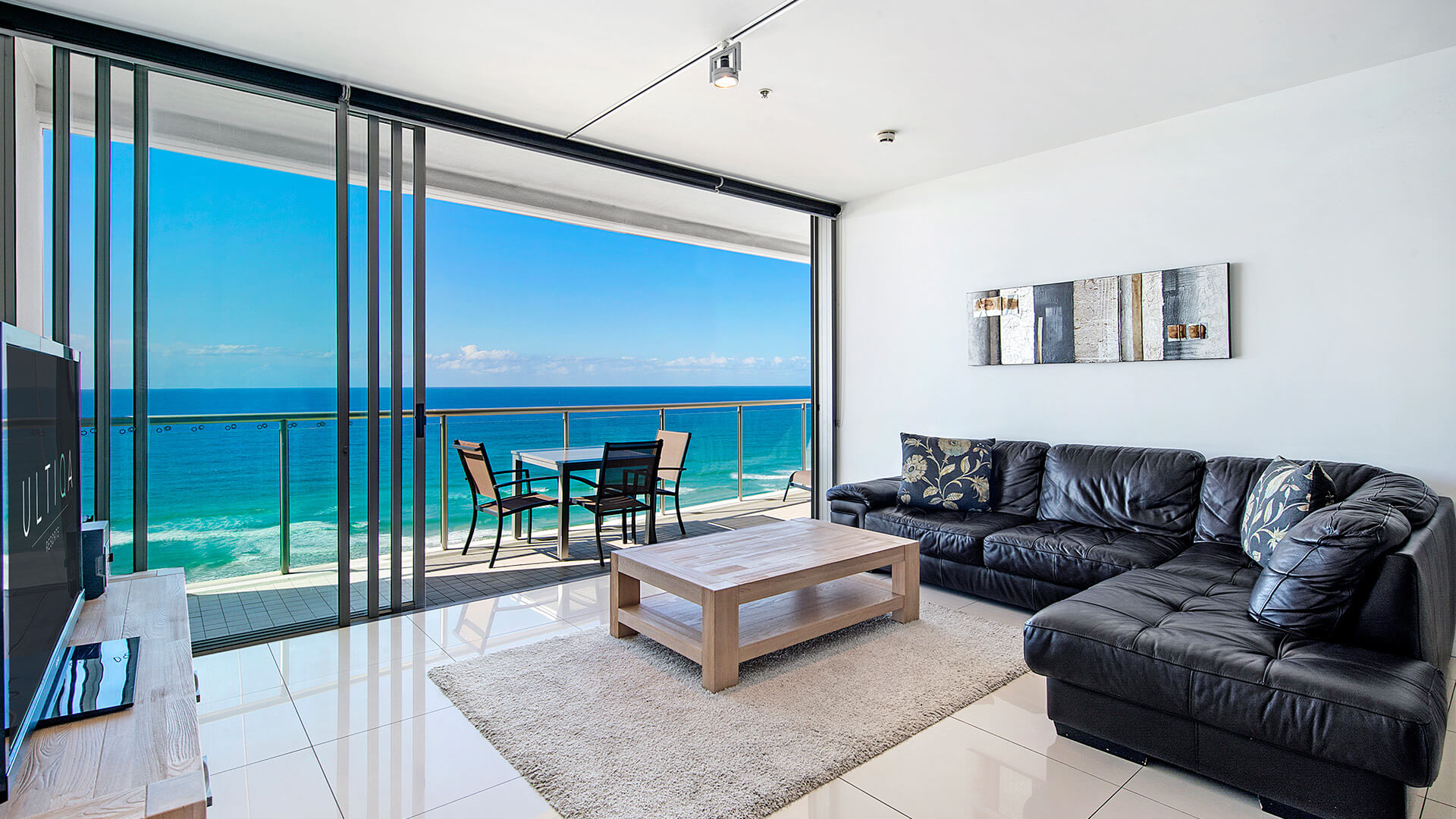 Living area with ocean views in 2 Bedroom Ocean View Apartment at ULTIQA Air on Broadbeach.