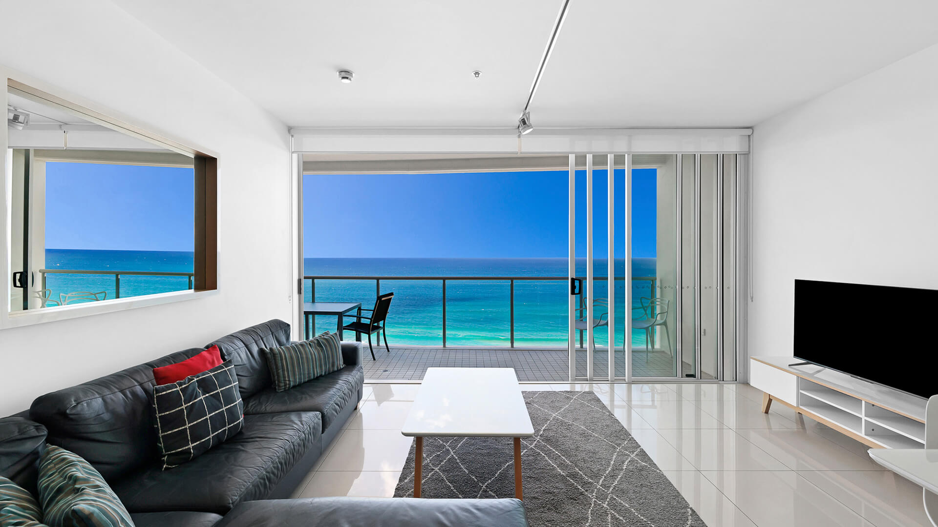 Ocean view living room with balcony in 2 Bedroom Ocean View Apartment at ULTIQA Air on Broadbeach.