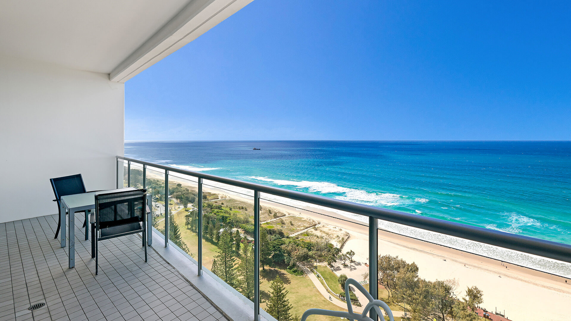 Private balcony with outdoor seating and stunning ocean views in the 2 Bedroom Ocean View Apartment at ULTIQA Air on Broadbeach.
