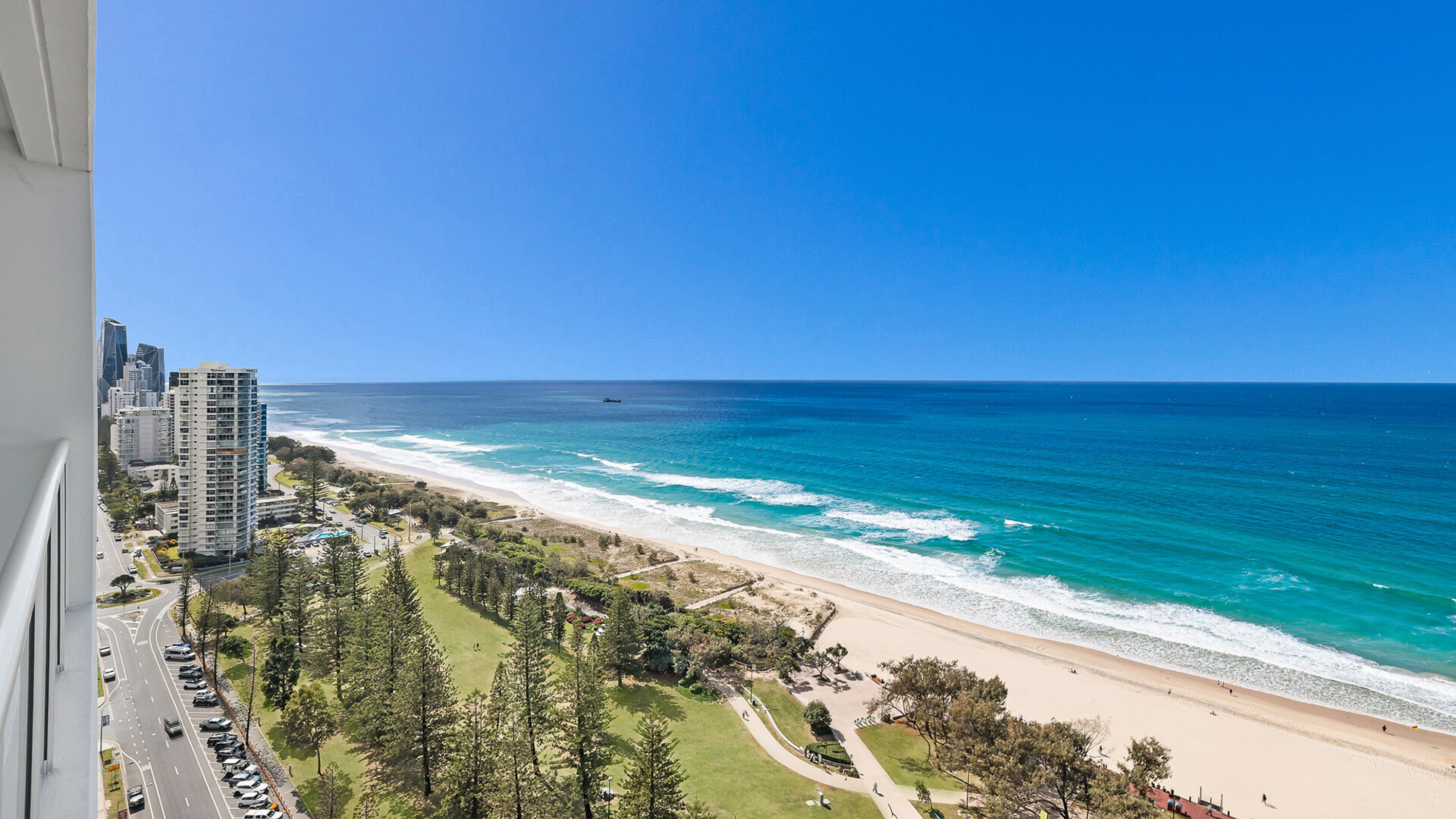 Ocean and city views overlooking Broadbeach parklands and coastline from the balcony of a 2 Bedroom Ocean View Apartment at ULTIQA Air on Broadbeach.