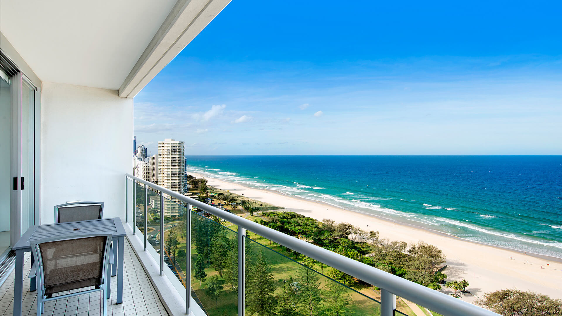 Private balcony with outdoor dining and panoramic ocean views – 2 Bedroom Ocean View Suite at ULTIQA Air on Broadbeach.