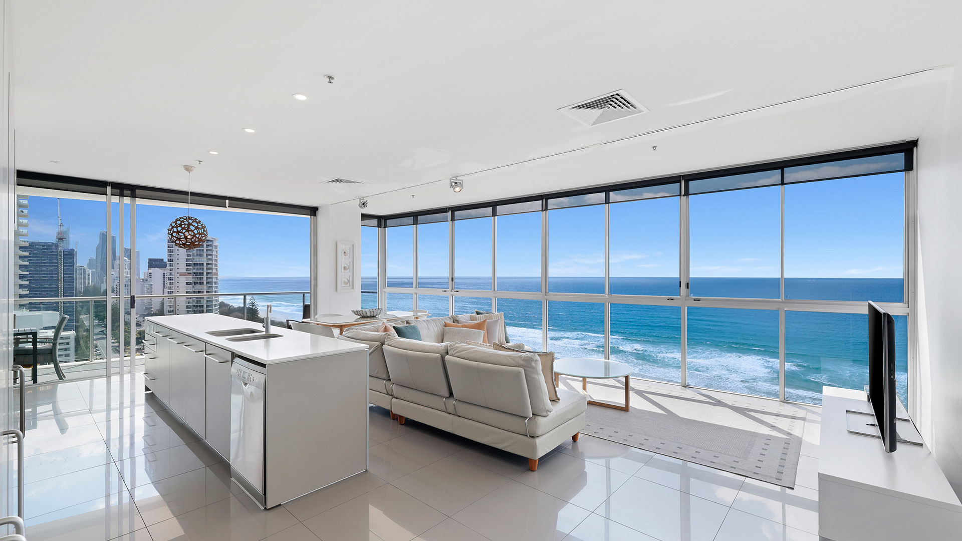 Spacious 3 Bedroom Ocean View Apartment at ULTIQA Air on Broadbeach with open-plan kitchen, living area, and panoramic ocean views.