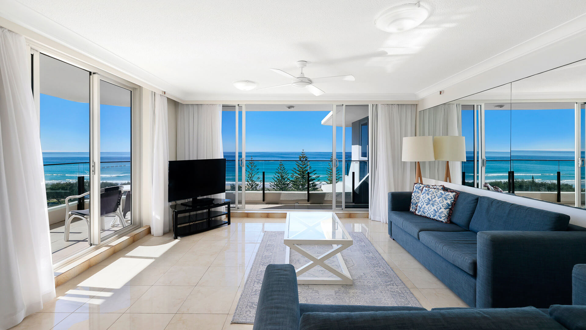 Living area with ocean views in the Standard 2 Bedroom Ocean View Apartment at ULTIQA Beach Haven.