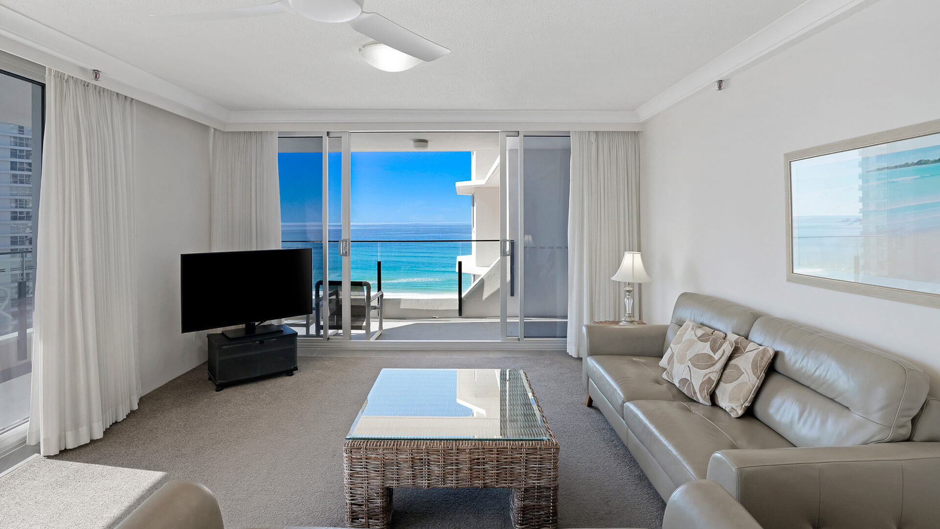 Living area with ocean views in the Standard 2 Bedroom Ocean View Apartment at ULTIQA Beach Haven.
