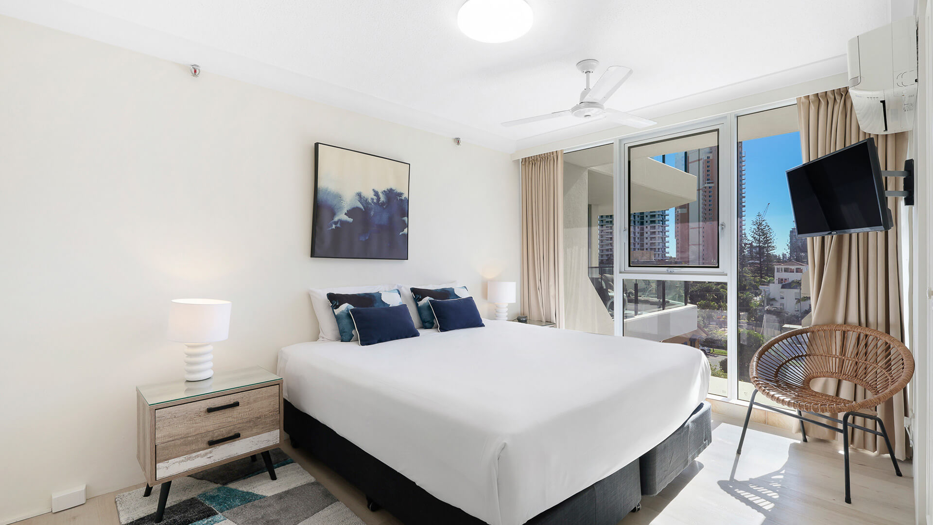 Master bedroom in the 2 Bedroom Ocean View Apartment at ULTIQA Beach Haven with king bed and natural light.