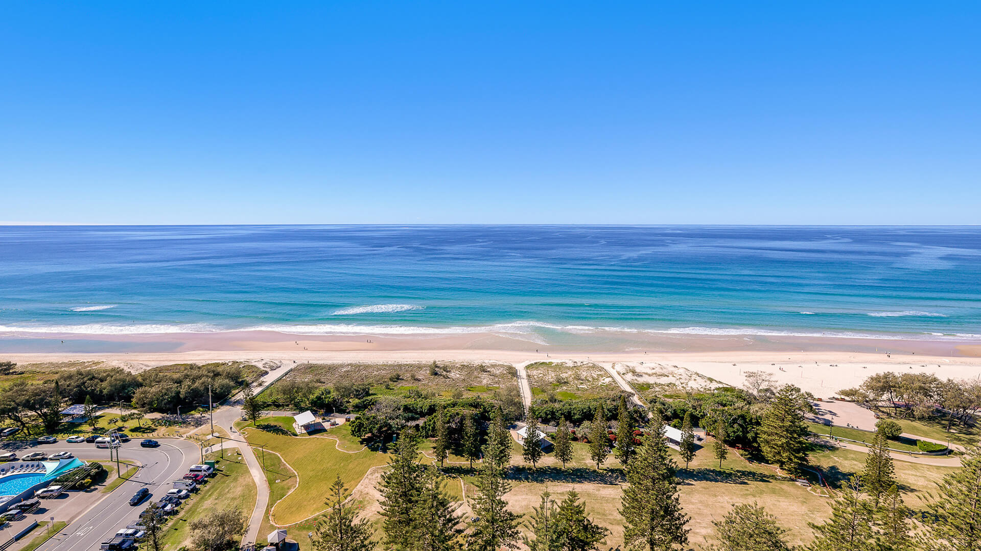 Uninterrupted ocean views, overlooking the coastline, parklands, and patrolled beach access.