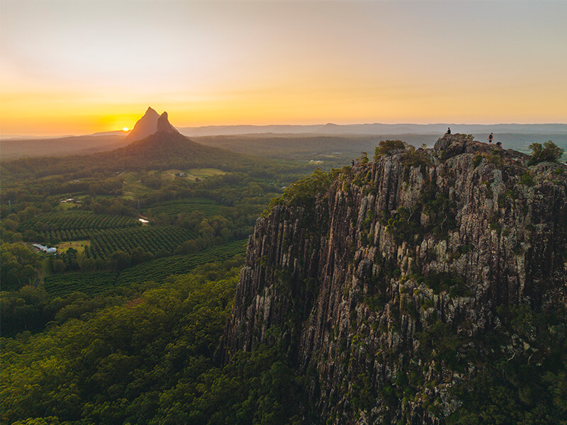Sunset over the Glass House Mountains on the Sunshine Coast.
