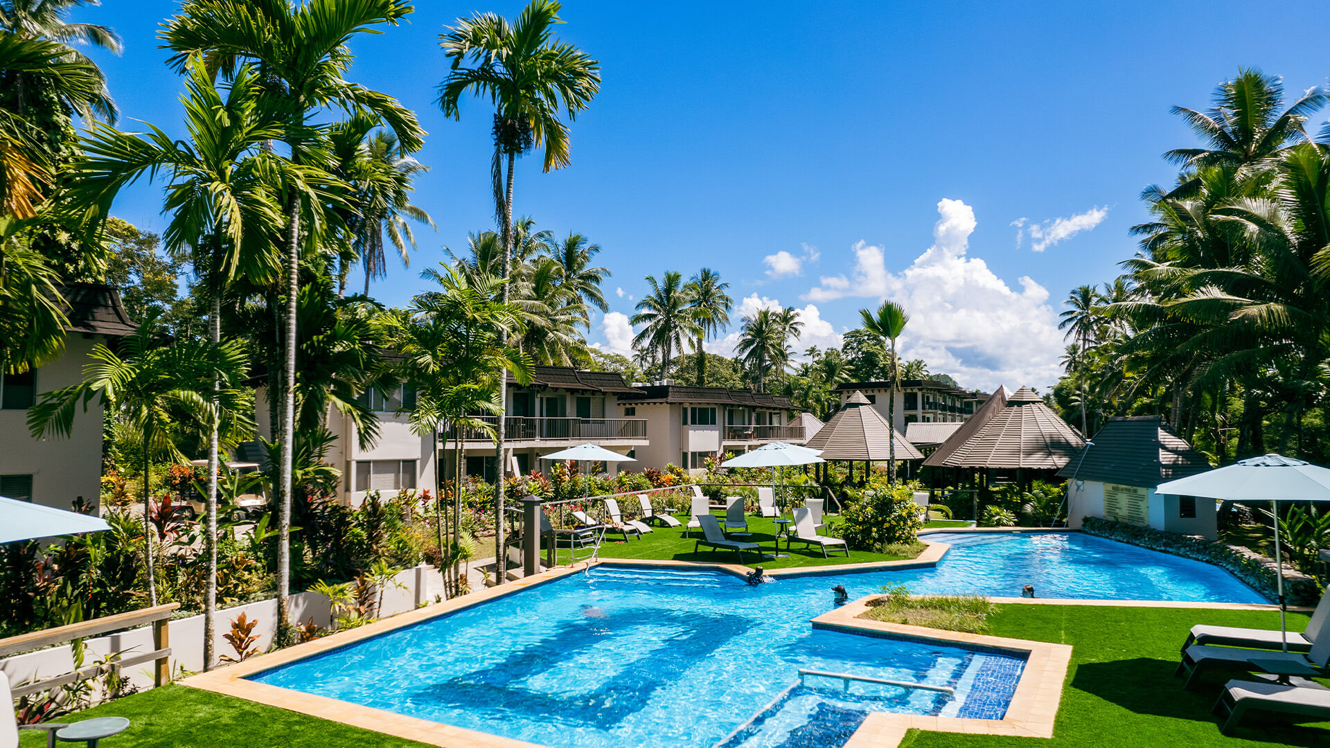 Resort pool and garden area at ULTIQA Fiji Palms Beach