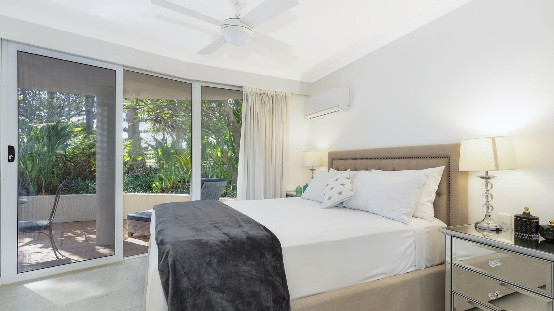 1 Bedroom Superior Apartment at ULTIQA Burleigh Mediterranean Resort with garden views and private patio.