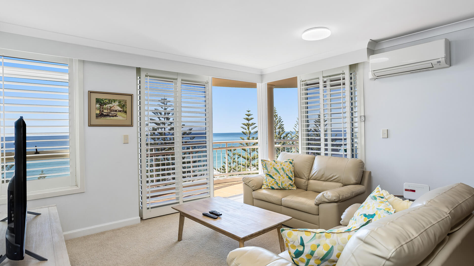 Lounge area with ocean views in 2 Bedroom Apartment at ULTIQA Burleigh Mediterranean Resort.