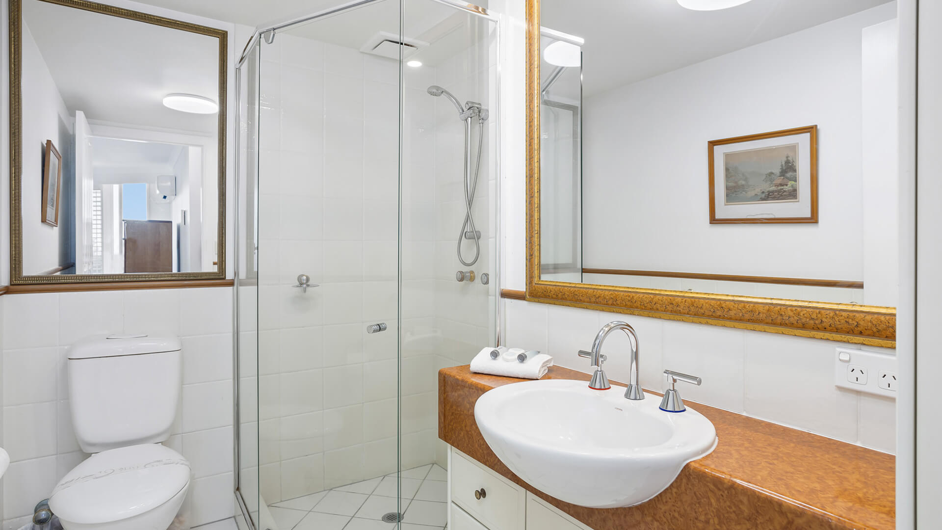 Bathroom with walk-in shower in 2 Bedroom Apartment at ULTIQA Burleigh Mediterranean Resort.