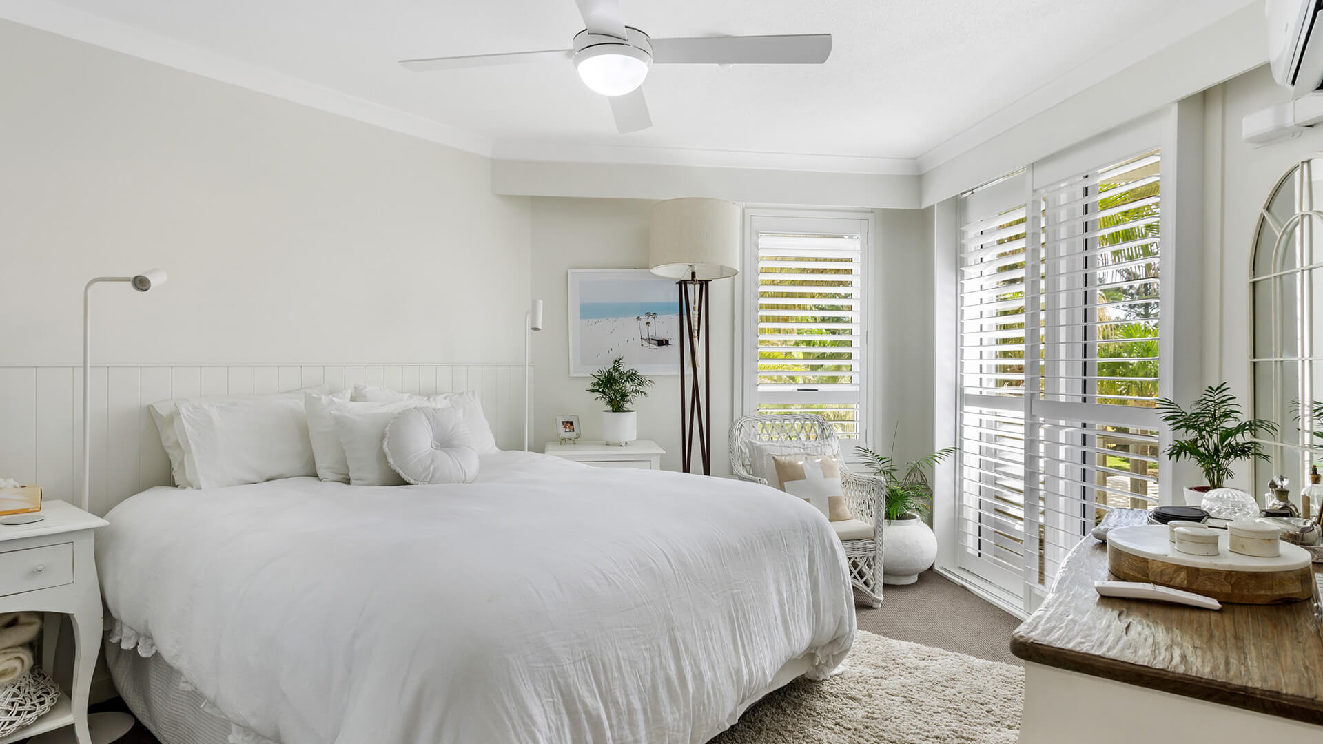 Bright and airy bedroom in 2 Bedroom Superior Apartment at ULTIQA Burleigh Mediterranean Resort.