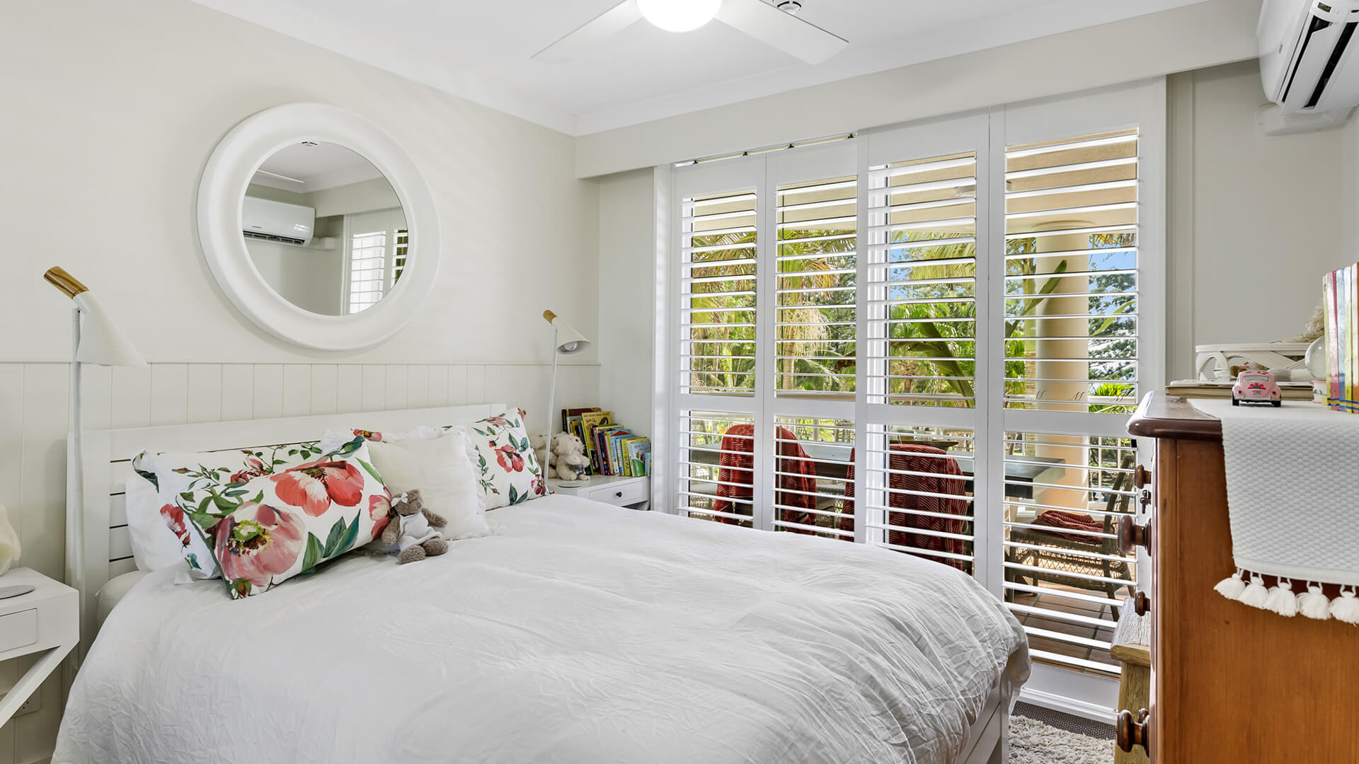 Second bedroom with queen bed and garden-view balcony in 2 Bedroom Superior Apartment at ULTIQA Burleigh Mediterranean Resort.