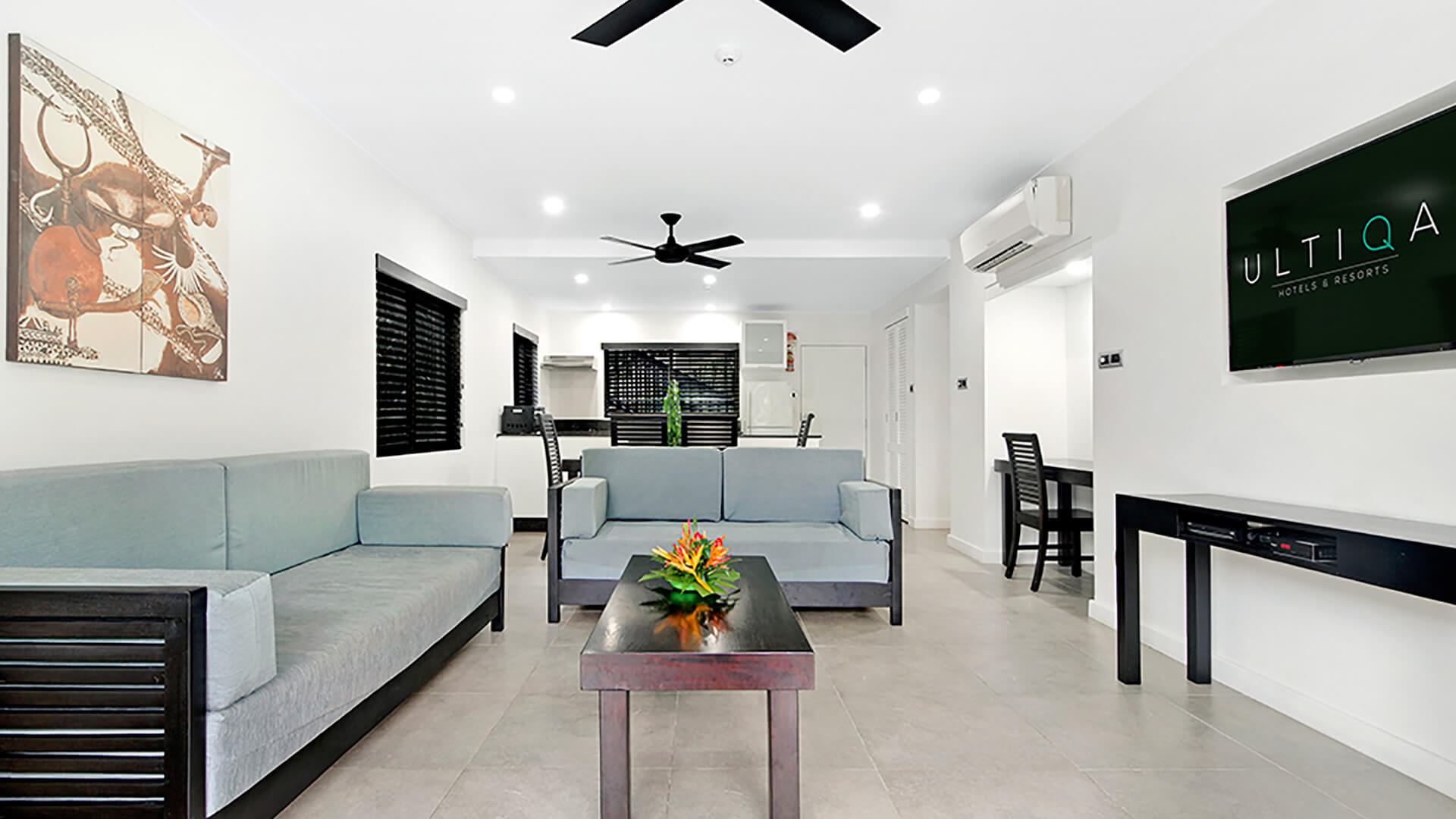 Spacious 2 Bedroom Apartment at ULTIQA Fiji with open-plan living, dining, and modern tropical décor.