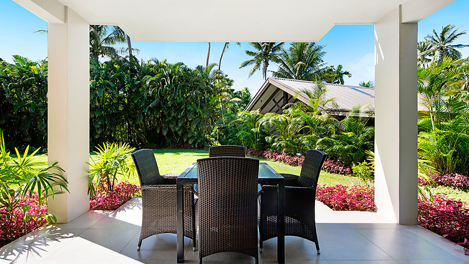Private outdoor patio with garden views from 2 Bedroom Apartment at ULTIQA Fiji.