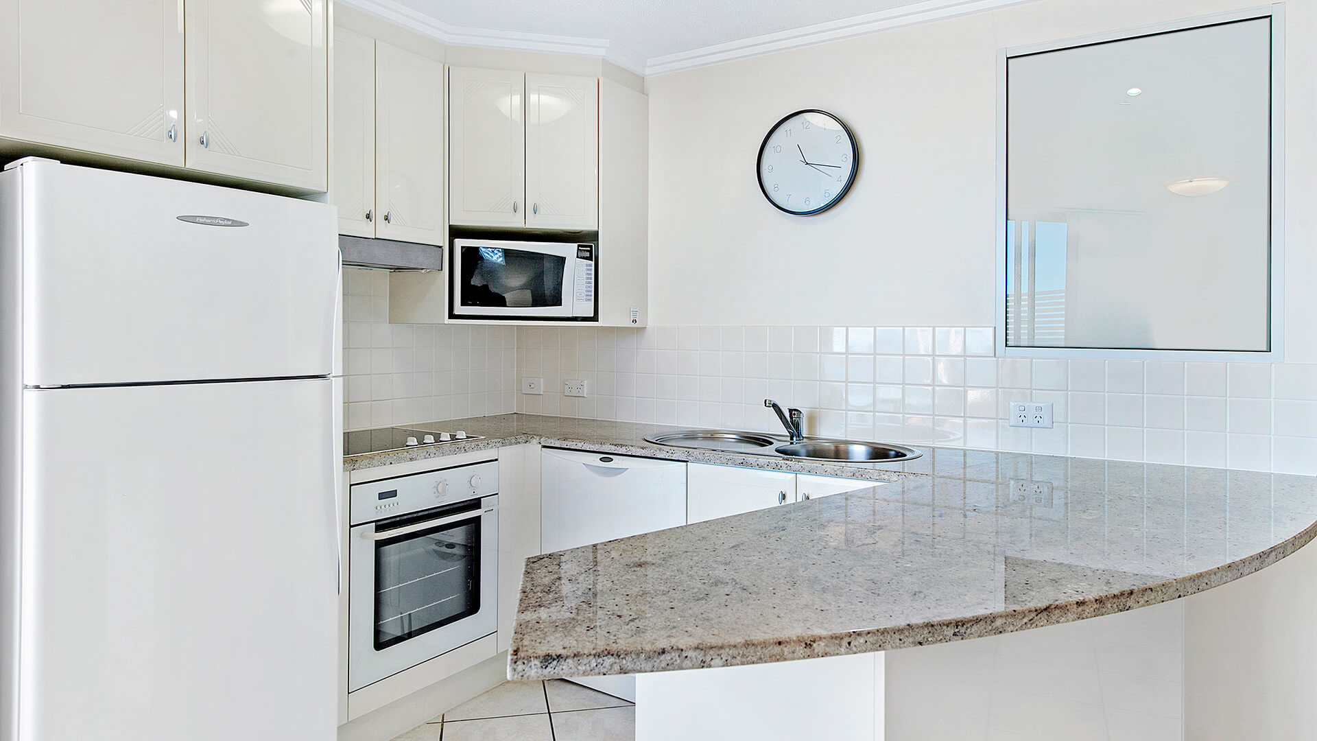 Fully equipped kitchen in 1 Bedroom Apartment at ULTIQA Shearwater Resort.