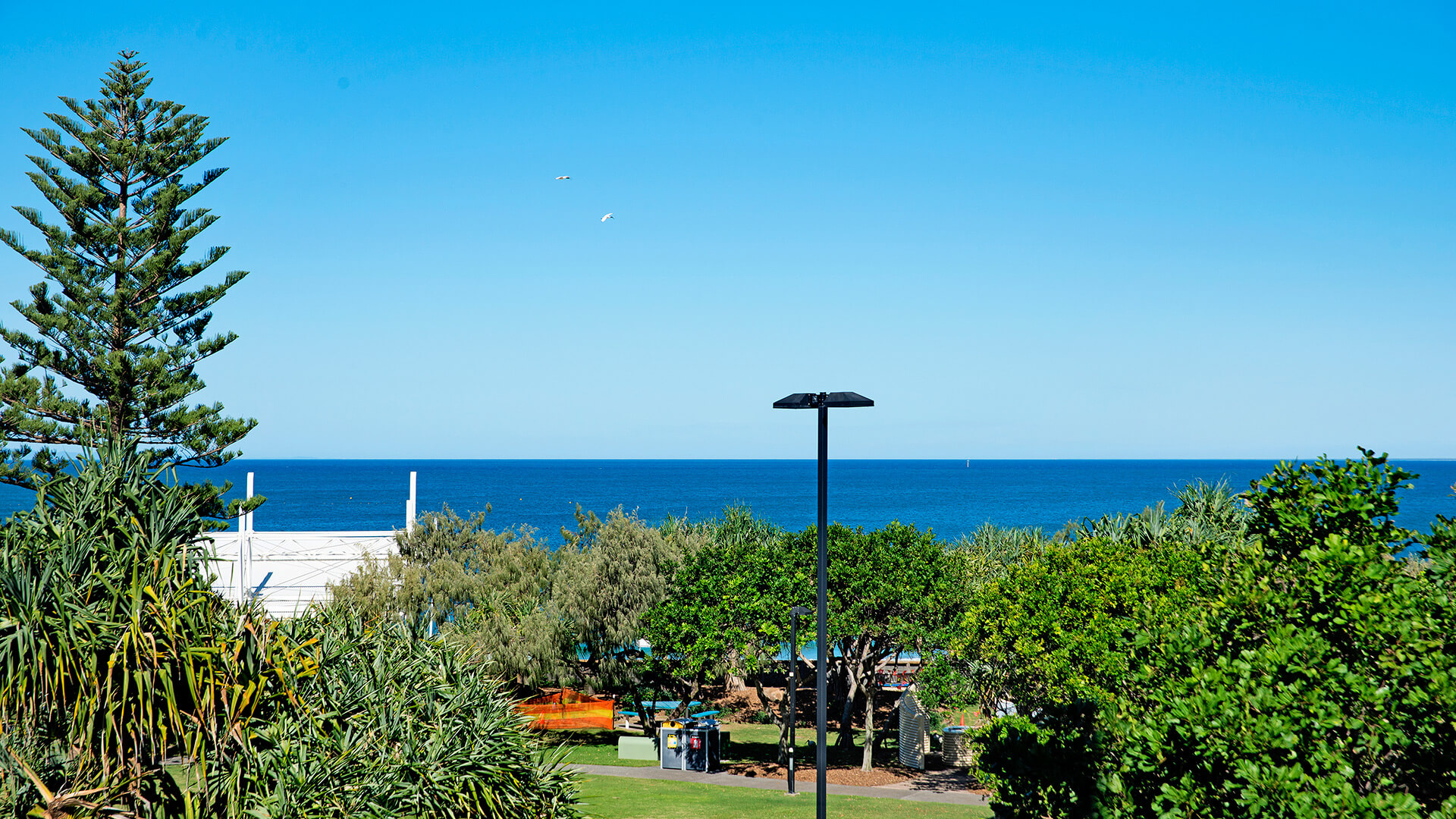 Ocean and park views from 1 Bedroom Apartment balcony at ULTIQA Shearwater Resort.