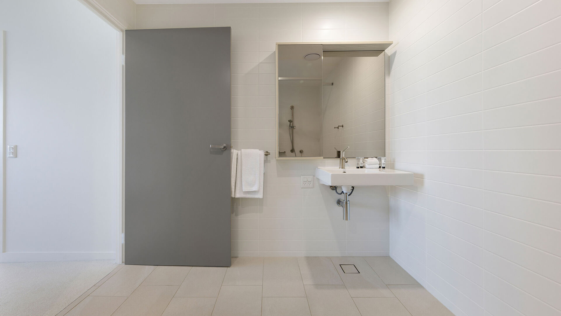 Accessible bathroom vanity in 2 Bedroom Accessible Suite at ULTIQA Signature at Broadbeach.