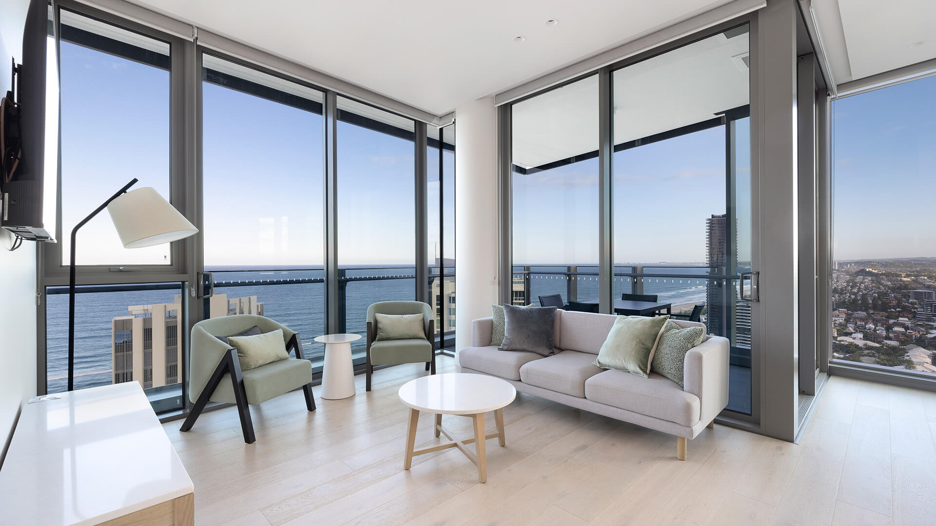 Ocean-view living area in the 2 Bedroom Ocean View Suite Premium at ULTIQA Signature at Broadbeach.