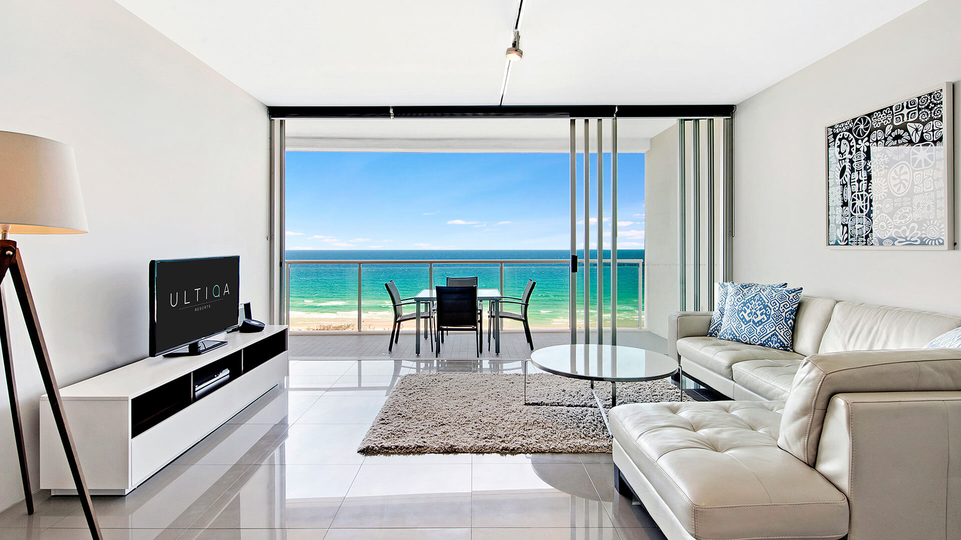Modern living room with ocean views and balcony in 1 Bedroom Ocean View Apartment at ULTIQA Air on Broadbeach
