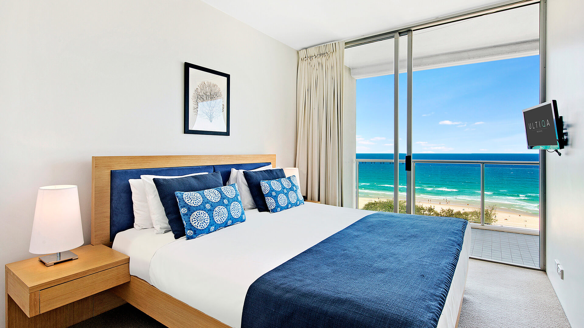 Bedroom with ocean views and balcony in 1 Bedroom Ocean View Apartment at ULTIQA Air on Broadbeach.