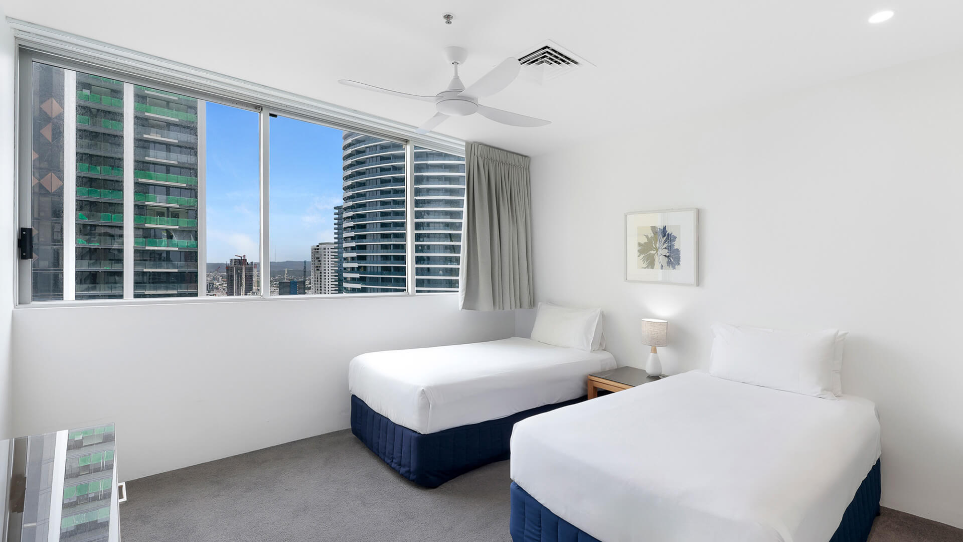 Modern bathroom with vanity and walk-in shower in 2 Bedroom Gold Coast View Suite at ULTIQA Air on Broadbeach.