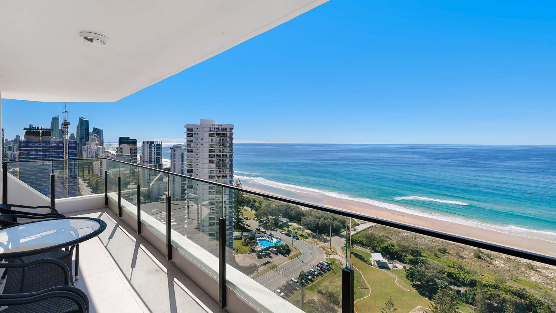 1 Bedroom Ocean View Apartment. Balcony with outdoor seating & beautiful sea view.